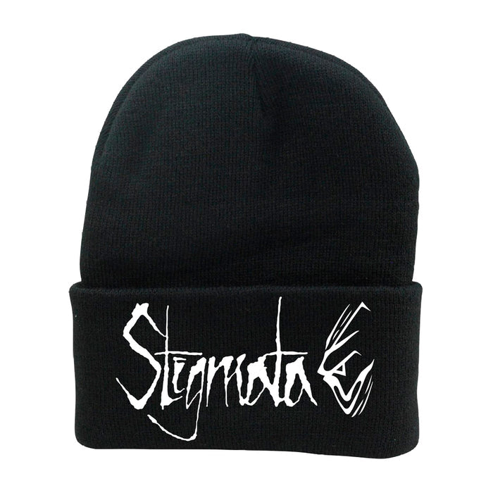 The Stigmata black knit beanie features bold, white, stylized jagged Stigmata lettering on the front fold.