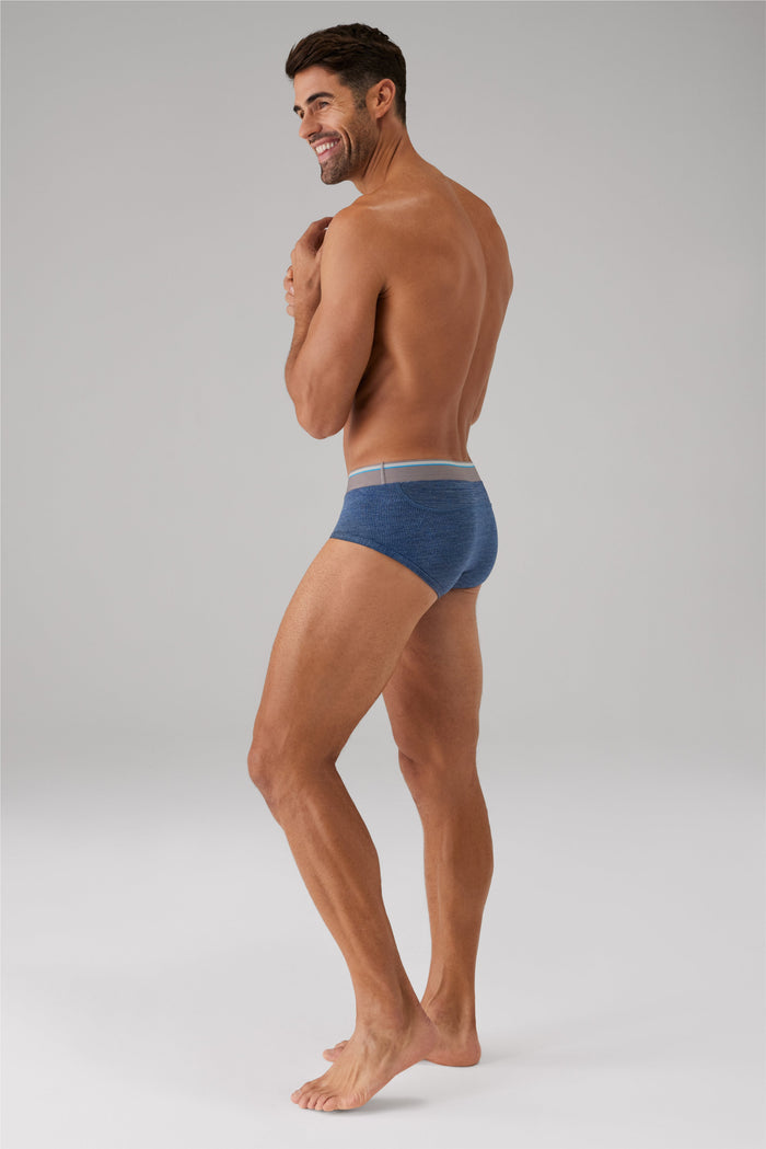 Whole body side view of a man wearing the AIRKNITˣ Brief