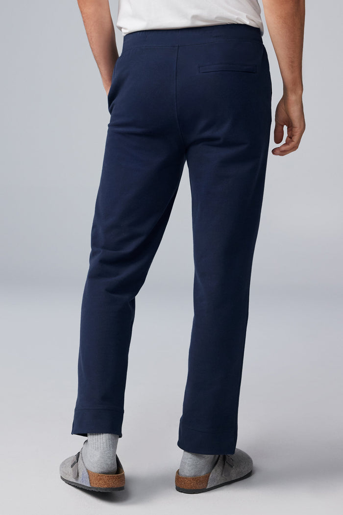 Back view of man wearing ACE Straight Leg Sweatpant in Total Eclipse