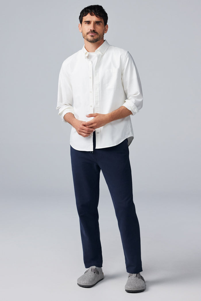 Full body front view of man wearing ACE Straight Leg Sweatpant in Total Eclipse
