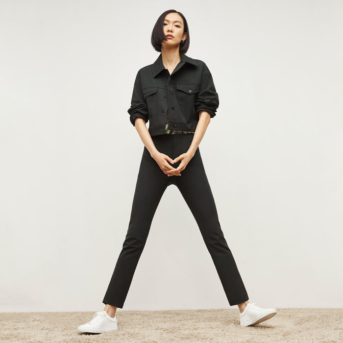 Front image of a woman standing wearing the anna jacket in hemlock | Lead