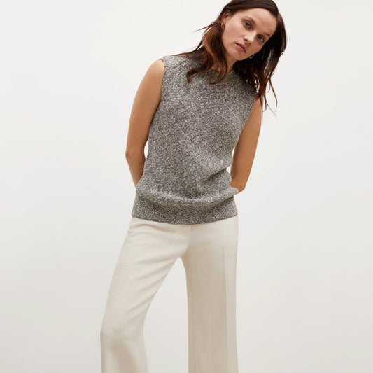 Front image of a woman standing wearing the Barbara Sweater—Knit Boucle in Black / White | Lead