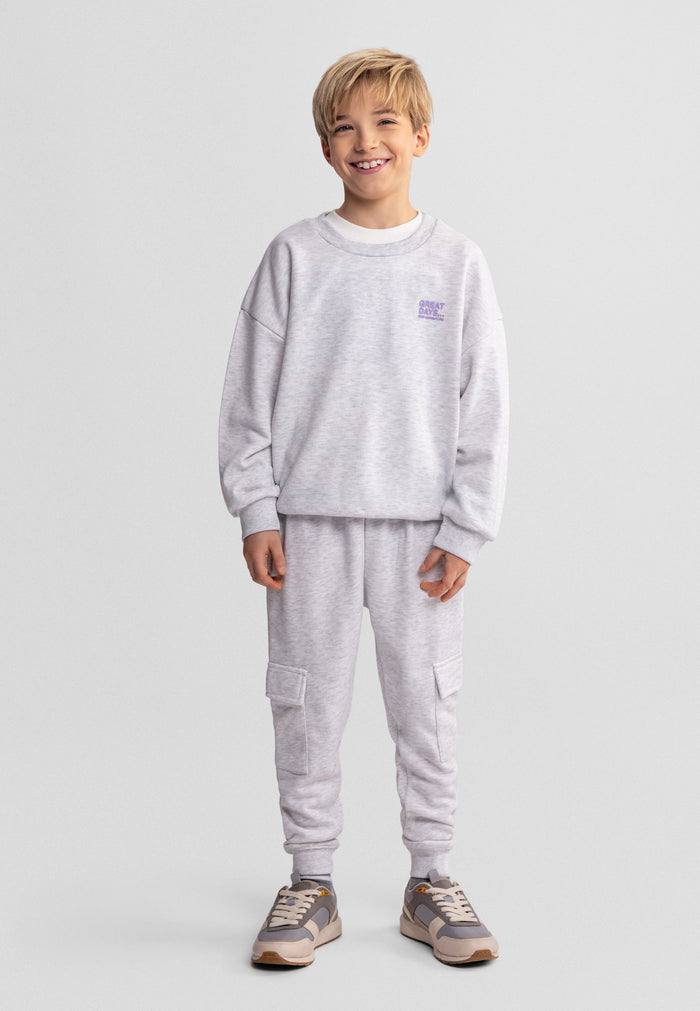 Boys grey cargo joggers, front view, elastic waistband and cargo pockets.