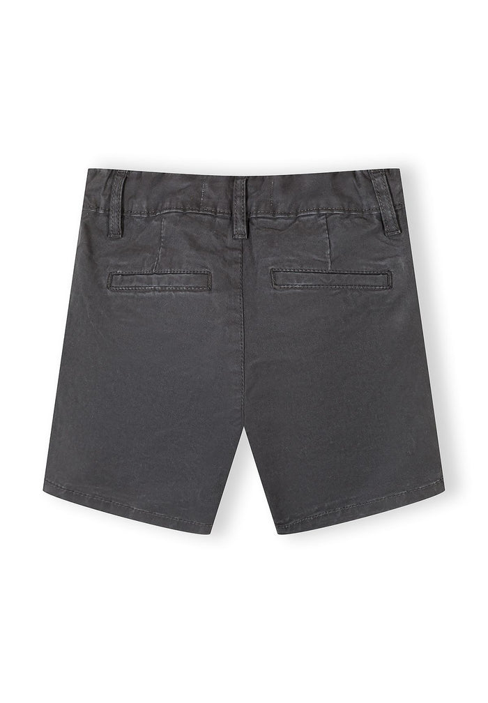 Boys' black chino shorts, back view, featuring belt loops and two back pockets.