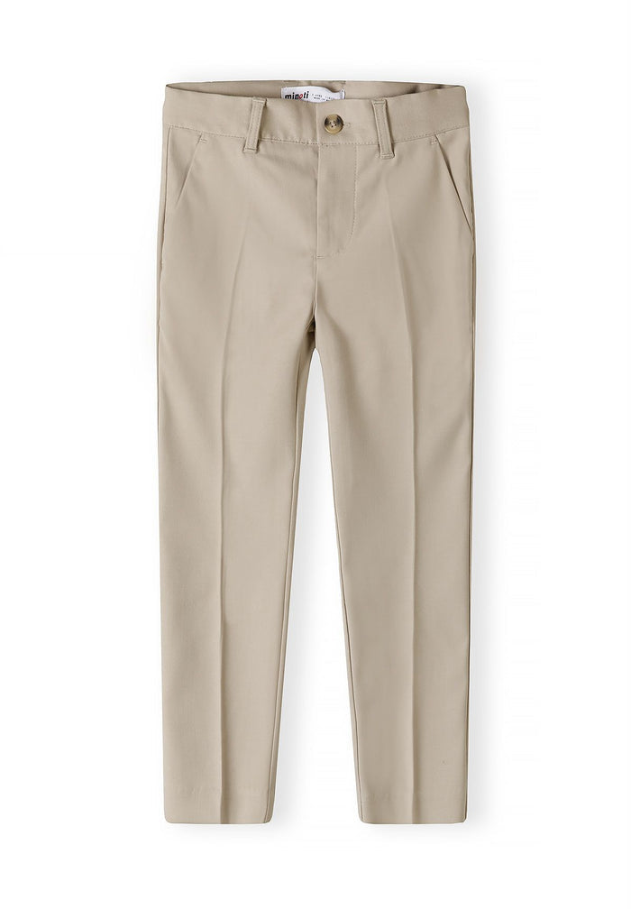 Boys formal suit trousers in stone color, front view with adjustable waistband and side pockets.