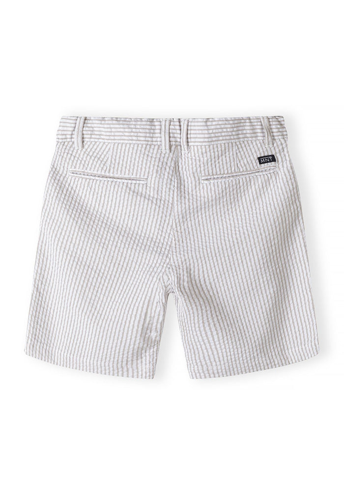 Boys tailored suit shorts in stone color, back view with two pockets and subtle striped pattern.