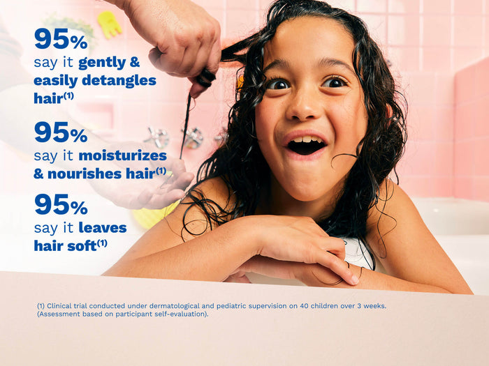 Mustela USA | Smiling child with wet curly hair leaning on a bathtub edge while an adult gently detangles her hair with conditioner. On-screen text highlights benefits: gently detangles, moisturizes, nourishes, and leaves hair soft.