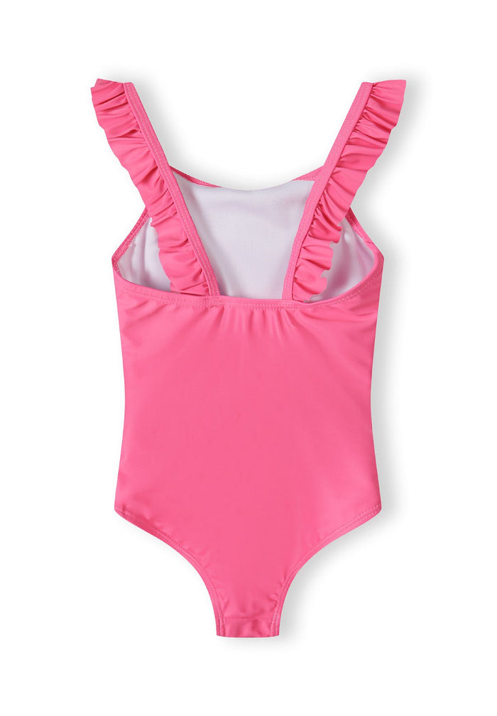 Back view of a pink one-piece swimsuit for girls with ruffled shoulder straps.