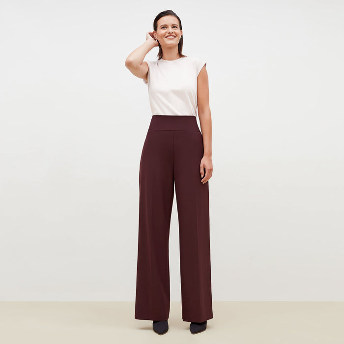 Front image of a woman standing wearing the Hadley Pant-Sharkskin in garnet | Lead
