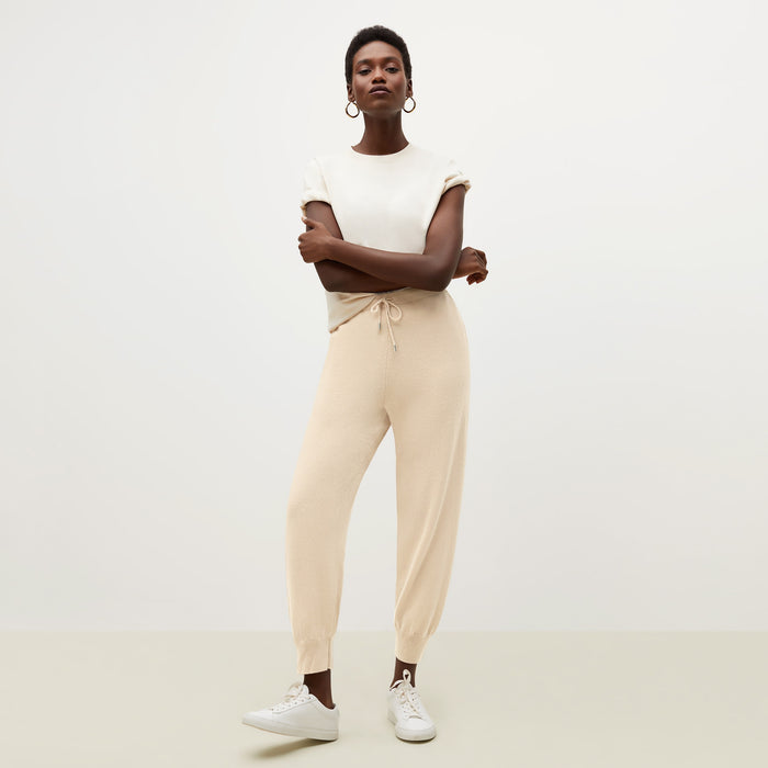 Front image of a woman standing wearing the Keely Jogger—Cashmere in Turbinado | Lead
