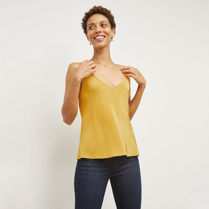 Front image of a woman standing wearing the Lisey Cami—Washable Silk in Dijon | Lead