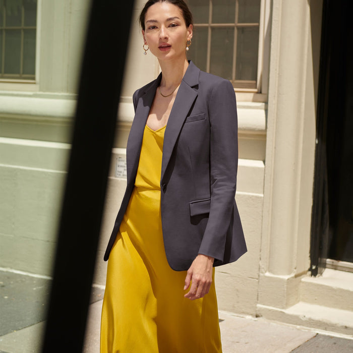 Front image of a woman standing wearing the Lisey Cami—Washable Silk in Dijon
