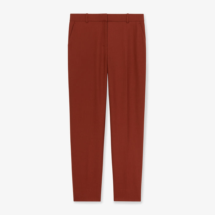Packshot image of the mejia pant in sharkskin in rust