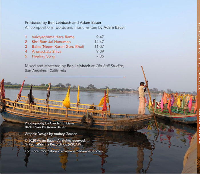 Several colorful wooden boats are docked on a calm river at sunset as a man in white stands on one boat. Music credits for Healing Song by Adam Bauer overlay the scene, with distant trees lining the opposite riverbank.