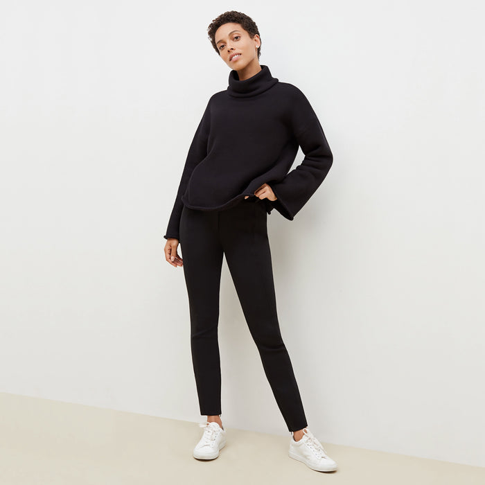 Front image of a woman standing wearing the Sharon Top—Plush Terry in Black