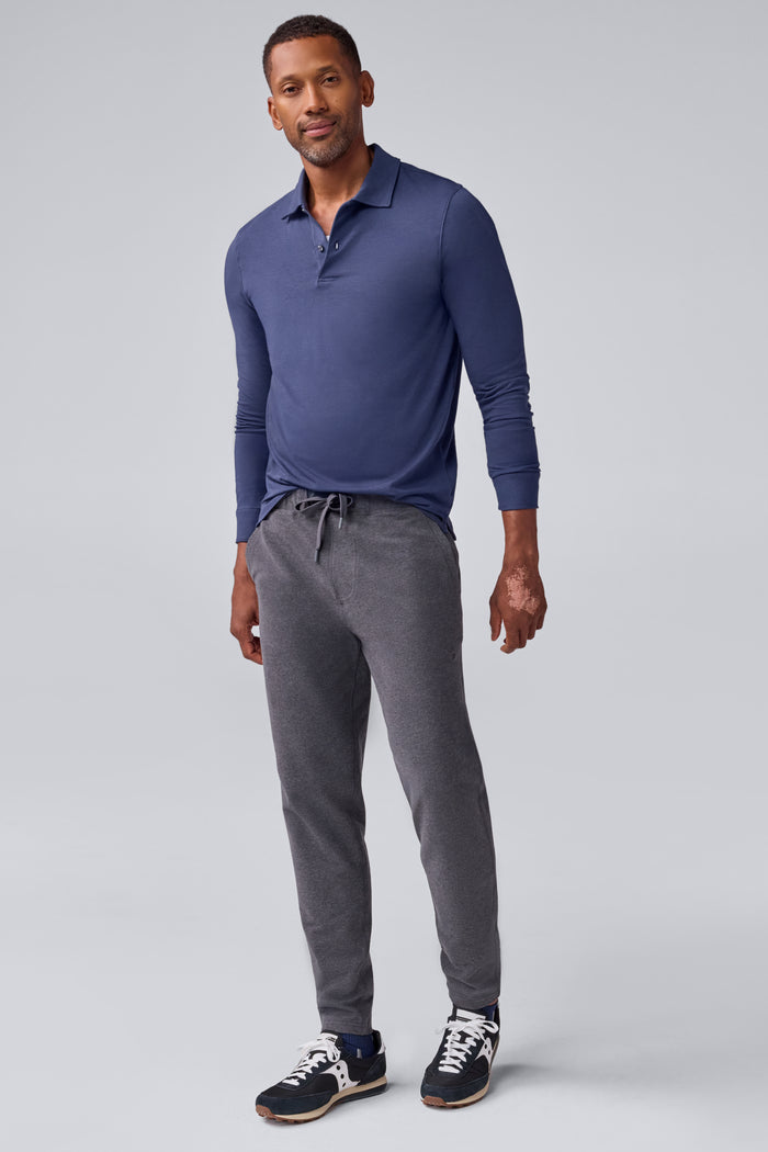 Full Front view of a man wearing Silver Long Sleeve Polo in True Navy