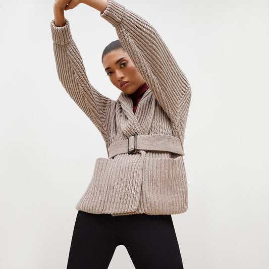 Front image of a woman standing wearing the Snyder Jacket—Lush Merino in Barley | Lead