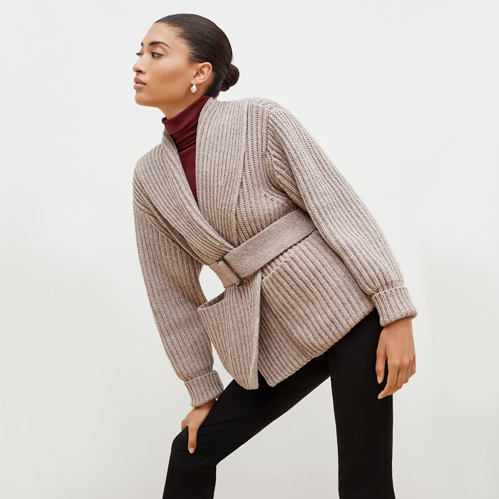 Front image of a woman standing wearing the Snyder Jacket—Lush Merino in Barley