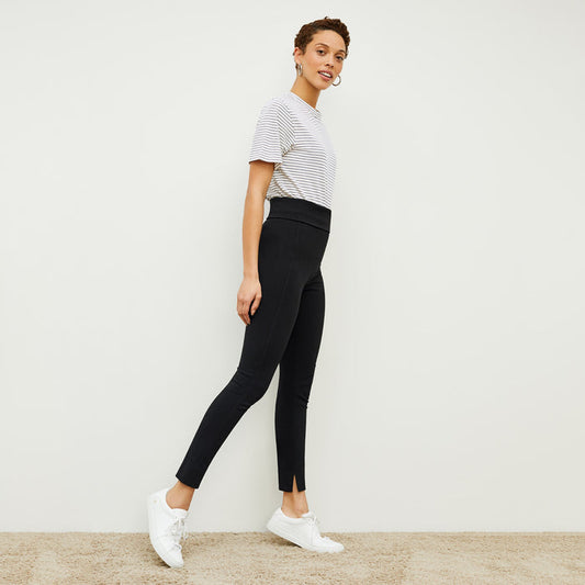 Side image of a woman standing wearing the stella legging in black | Lead