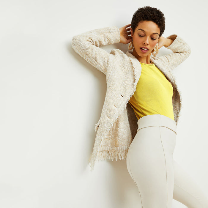 Side image of a woman standing wearing the stella legging in pearl