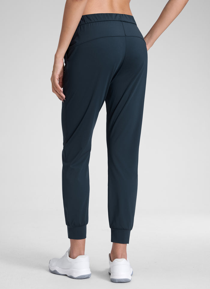 CRZ YOGA Women's Travel Slim Fit Stretch Drawstring Jogger 27'' True Navy