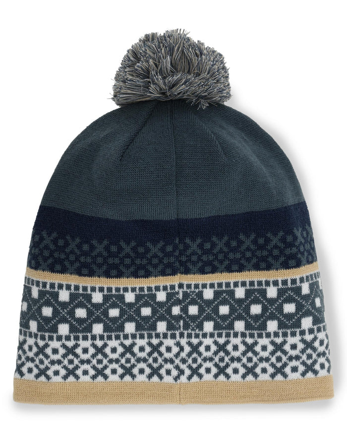 Knitted beanie with pom-pom and patterned design on a white background