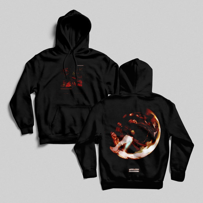 Two black Boundaries Pullover Hoodies on a gray background. The front has a small red graphic and logo, while the back displays a large circular image with dynamic, blurred figures and text at the bottom.